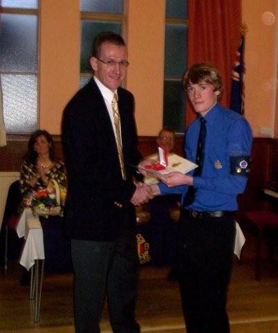 Callum Urie receiving his Queens Badge