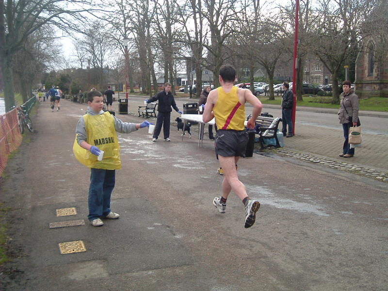 More Runners begin to arrive at the Water Station